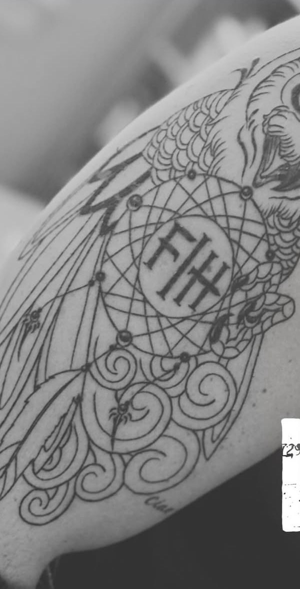 An owl and FH tattoo from the Fellowship community